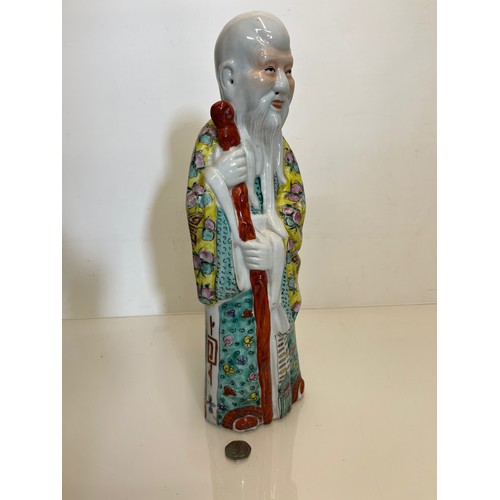 446 - Chinese ceramics, a famile rose figure of Shou Lao God of Longevity, 42 cm high.

This lot is availa... 