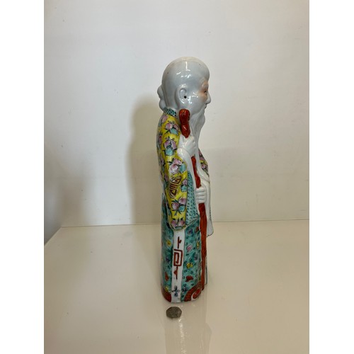 446 - Chinese ceramics, a famile rose figure of Shou Lao God of Longevity, 42 cm high.

This lot is availa... 