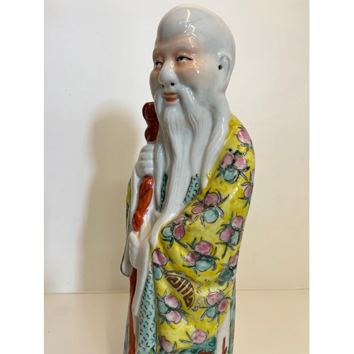 446 - Chinese ceramics, a famile rose figure of Shou Lao God of Longevity, 42 cm high.

This lot is availa... 