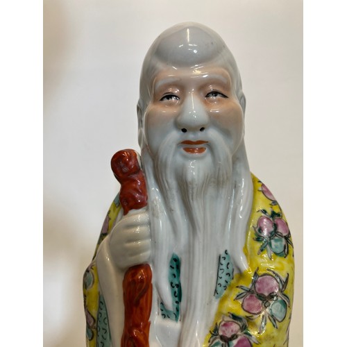 446 - Chinese ceramics, a famile rose figure of Shou Lao God of Longevity, 42 cm high.

This lot is availa... 