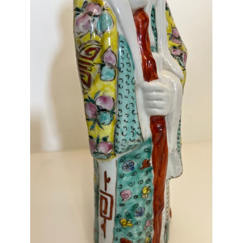 446 - Chinese ceramics, a famile rose figure of Shou Lao God of Longevity, 42 cm high.

This lot is availa... 