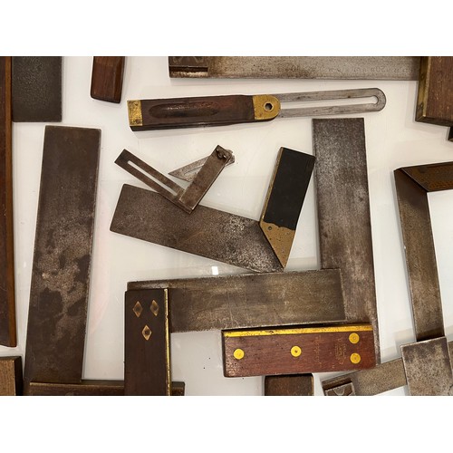 457 - A collection of set squares and others, part of a large collection of carpentry tools. 28 items in a... 