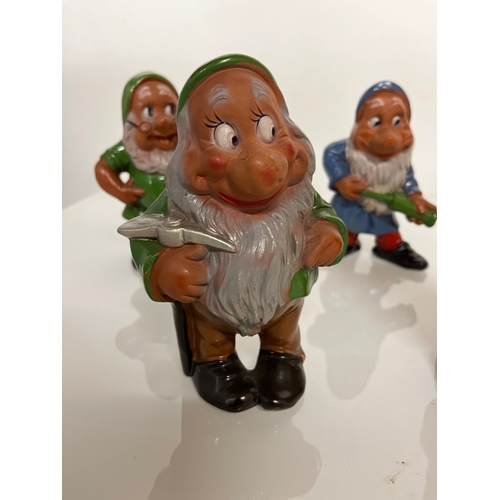 369 - Terracotta Disney Collectable, a set of mid century hand decorated Seven Dwarfs.

This lot is availa... 