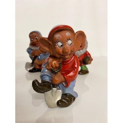 369 - Terracotta Disney Collectable, a set of mid century hand decorated Seven Dwarfs.

This lot is availa... 