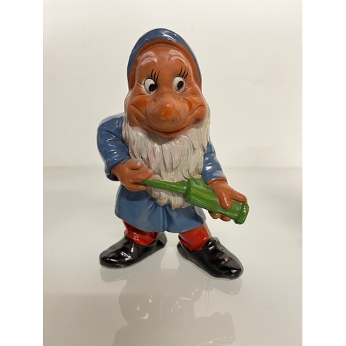 369 - Terracotta Disney Collectable, a set of mid century hand decorated Seven Dwarfs.

This lot is availa... 