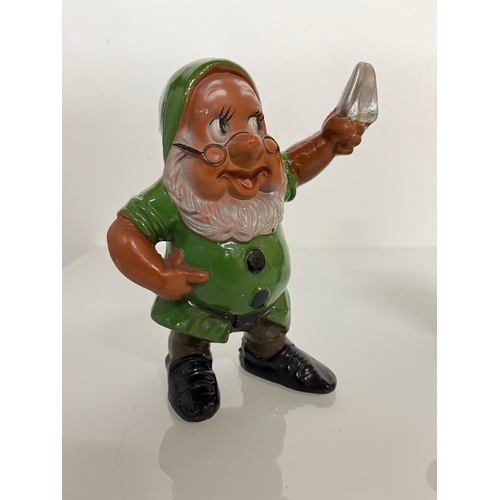 369 - Terracotta Disney Collectable, a set of mid century hand decorated Seven Dwarfs.

This lot is availa... 