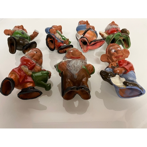 369 - Terracotta Disney Collectable, a set of mid century hand decorated Seven Dwarfs.

This lot is availa... 