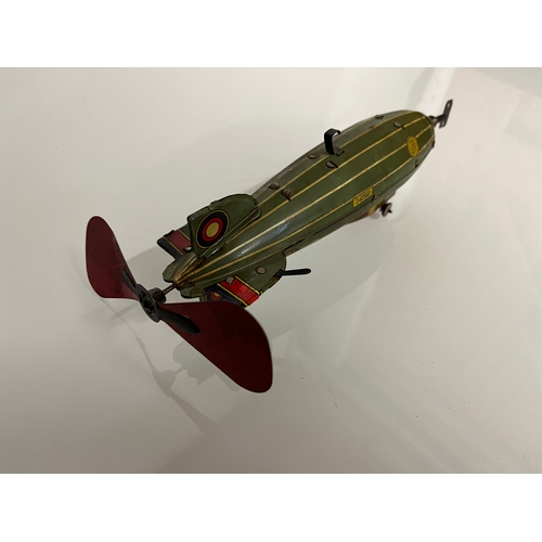 370 - Lithographed tin plate clockwork toy zepplin. 23 cm long.

This lot is available for in house shippi... 