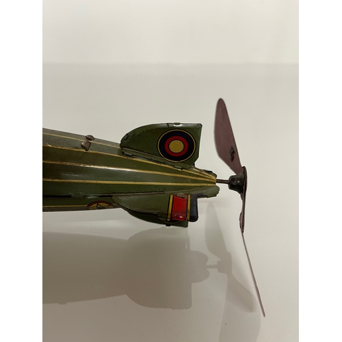 370 - Lithographed tin plate clockwork toy zepplin. 23 cm long.

This lot is available for in house shippi... 