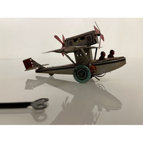 371 - lithographed tin plate toy flying boat, 17 cm long.

This lot is available for in house shipping