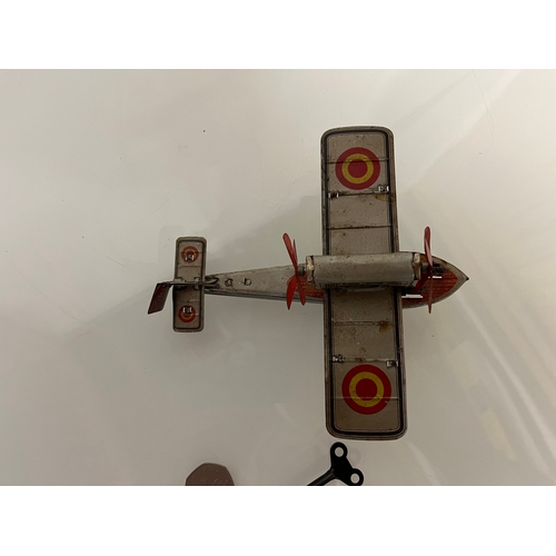 371 - lithographed tin plate toy flying boat, 17 cm long.

This lot is available for in house shipping