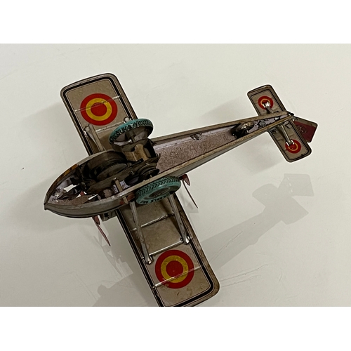 371 - lithographed tin plate toy flying boat, 17 cm long.

This lot is available for in house shipping