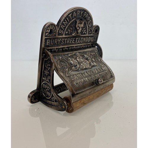 21 - Nickel plated cast iron toilet roll holder. 15 cm high.

This lot is available for in-house shipping