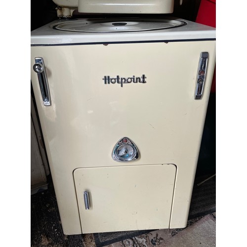 31 - A cream enamelled Hotpoint washing machine and mangle.

This lot is collection only.