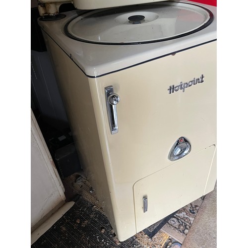 31 - A cream enamelled Hotpoint washing machine and mangle.

This lot is collection only.