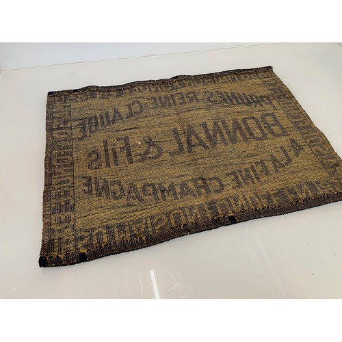 33 - Breweryana, a tapestry Champagne advertising mat 70 cm x 50 cm.

This lot is available for in-house ... 