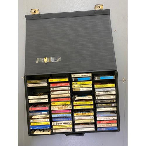 496 - Hard case containing a selection of cassette tapes. Mixture of classical, pop and rock. Selection of... 