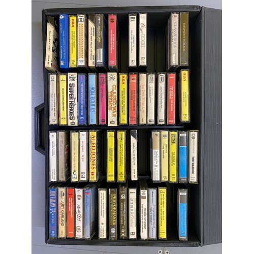 496 - Hard case containing a selection of cassette tapes. Mixture of classical, pop and rock. Selection of... 