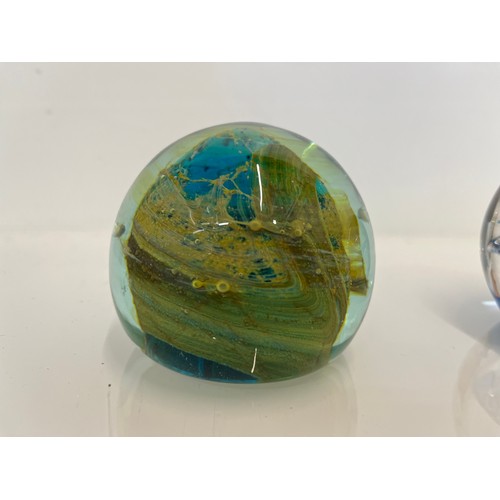 497 - A collection of 8 glass paper weights, Modena, Caithness and Selkirk Glass.

This lot is available f... 