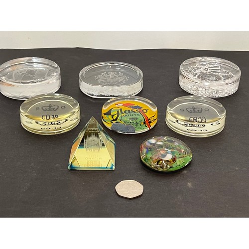 500 - A collection of 8 glass paper weights advertising paints etc, two marked for the Stationary Office.
... 