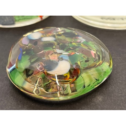 500 - A collection of 8 glass paper weights advertising paints etc, two marked for the Stationary Office.
... 