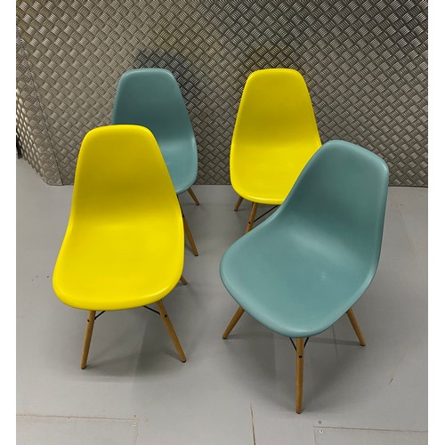 68 - Mid century designer furniture, set of four duotone Eames dinning chairs by Vitra.

This lot is coll... 