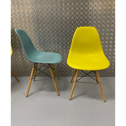 68 - Mid century designer furniture, set of four duotone Eames dinning chairs by Vitra.

This lot is coll... 