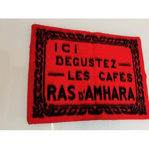 188 - A woven mat advertising Coffee Ras D’Amhara. 58 cm x 43 cm.

This lot is available for in-house ship... 