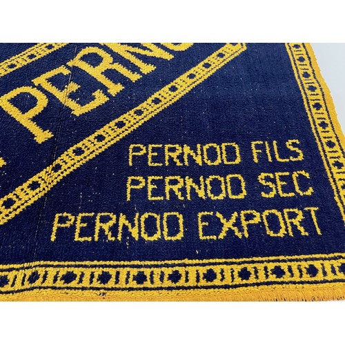 189 - A woven tapestry mat advertising Pernod, 61 cm x 51 cm.

This lot is available for in-house shipping