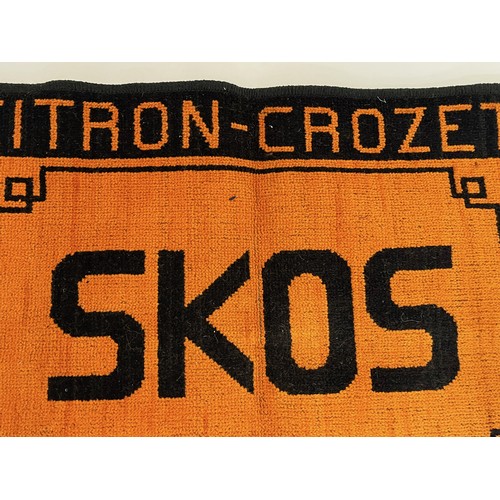 190 - A woven tapestry mat adverting Citron – Crozet, 71 cm x 51 cm.

This lot is available for in-house s... 