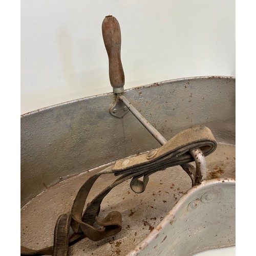 192 - A galvinised seed sewing bucket, a galvinised pail and a wire potato basket.

This lot is collection... 