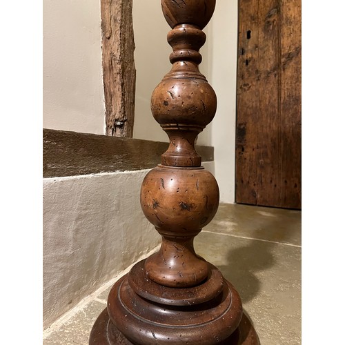 218 - Large turned wooden stand 100cm tall 17 cm diameter at the top and 30 cm diameter at the base.

This... 