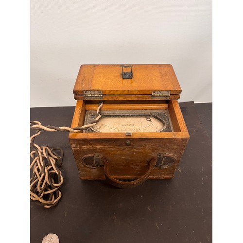 289 - Vintage engineering tools, oak cased electrical test meter, 18cm x 18cm x 14cm 

This lot is availab... 