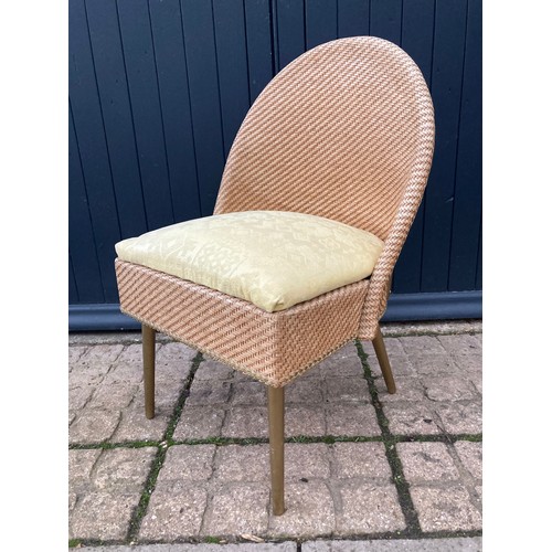 224 - Art Deco lloyd Loom style furniture, a Mid Century woven chair with upholstered seat.

This lot is c... 