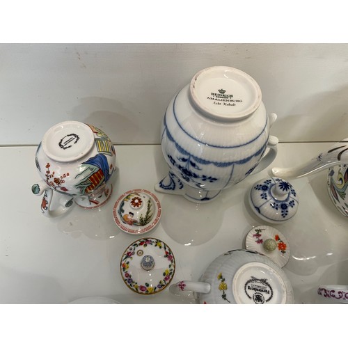 200 - A collection of twelve decorative tea pots, Spode, V & A collection, Coalport etc.

This lot is avai... 