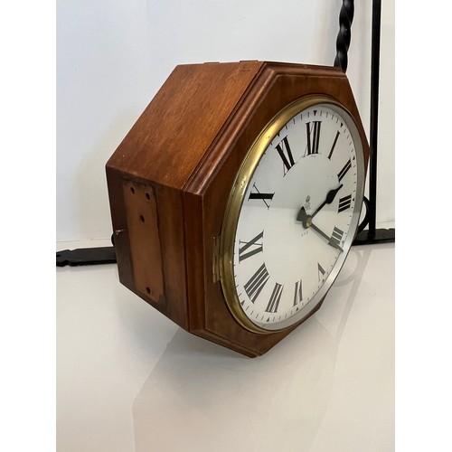 205 - A 12 inch double sided GPO hanging clock with a fusee movement. Features a fully serviced and cleane... 