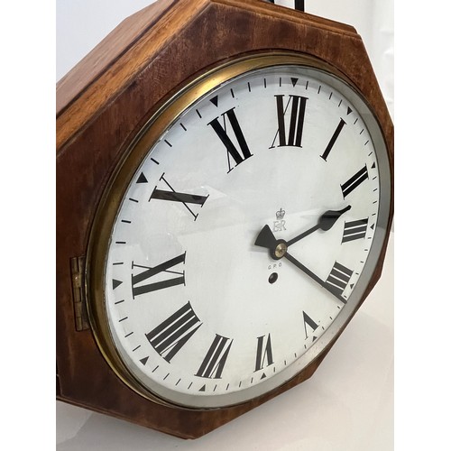 205 - A 12 inch double sided GPO hanging clock with a fusee movement. Features a fully serviced and cleane... 