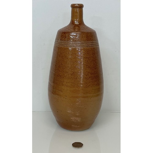 433 - Art pottery salt glazed stone wear vase. 34 cm high and 15 cm in diameter.

This lot is available fo... 