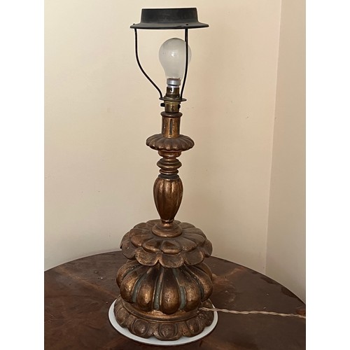 225 - Gilded wooden lamp base, 60 cm high, 22 cm diameter at the base.

This lot is available for in-house... 