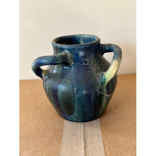 458 - Three handled studio pottery vase marked C to the base.

This lot is available for in-house shipping