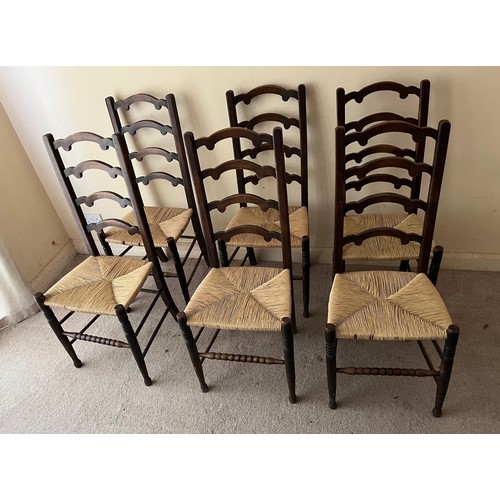 243 - Six rush seated dinning chairs.

This lot is collection only.