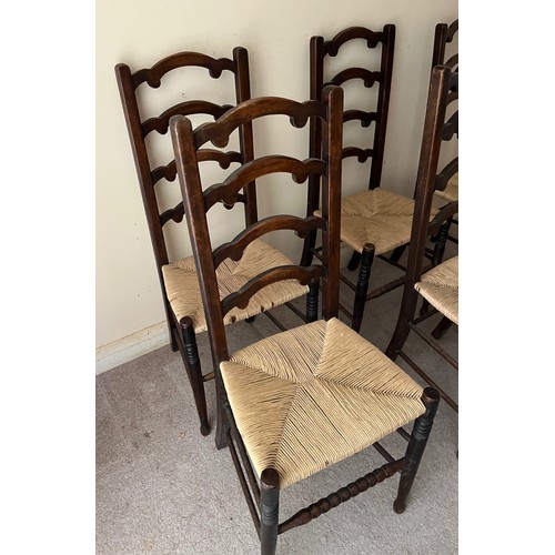 243 - Six rush seated dinning chairs.

This lot is collection only.