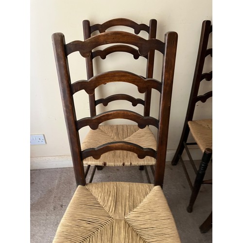 243 - Six rush seated dinning chairs.

This lot is collection only.