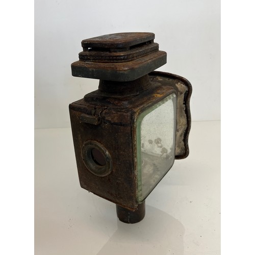 470 - Early motoring or carriage candle lantern, unusual square lense to the front, 30cm tall overall.

Th... 