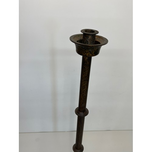 471 - A patinated brass candle stand 83 cm tall.

This lot is available for in-house shipping