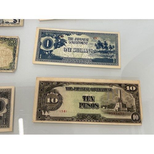 415 - A collection of post war Japanese bank notes etc.

This lot is available for in-house shipping