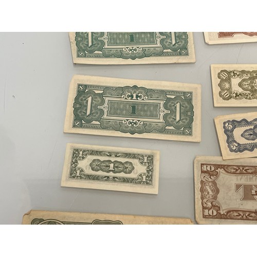 415 - A collection of post war Japanese bank notes etc.

This lot is available for in-house shipping