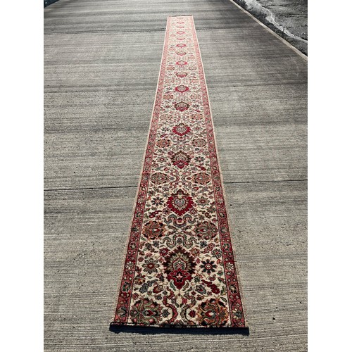 497 - A 6.2m long x 69 cm wide carpet, a good condition hall runner.


This lot is collection only