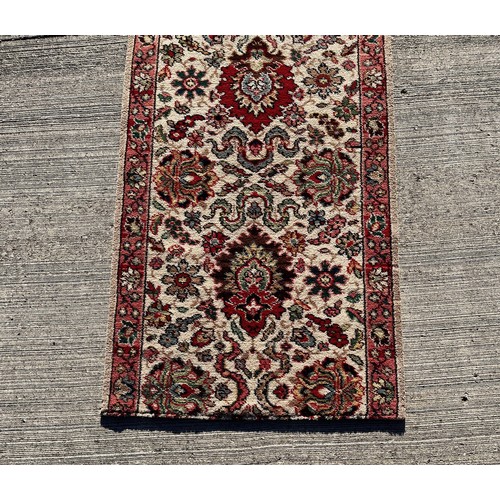 497 - A 6.2m long x 69 cm wide carpet, a good condition hall runner.


This lot is collection only