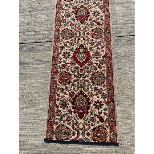 497 - A 6.2m long x 69 cm wide carpet, a good condition hall runner.


This lot is collection only